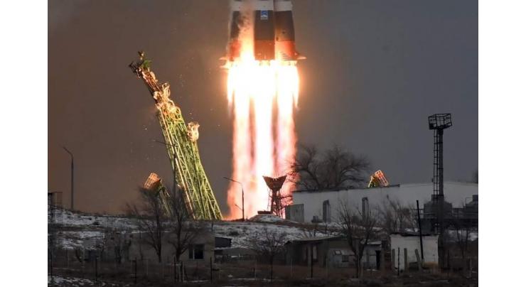 Russian rocket carrying Japanese billionaire docks at ISS
