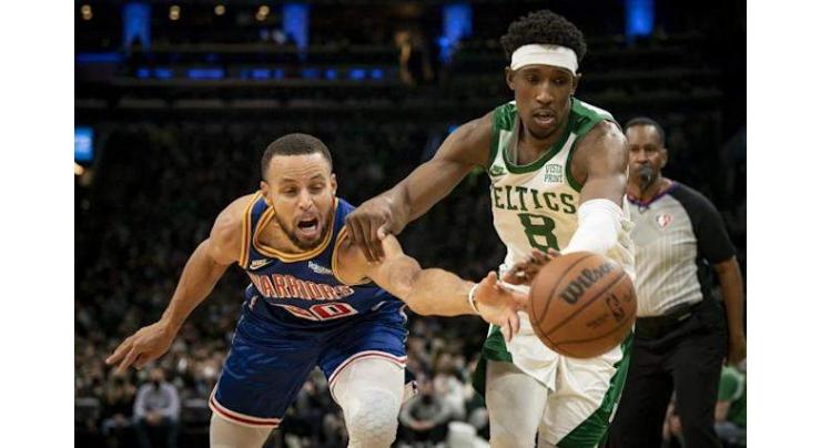 Curry stars again in nervy win over Celtics, T'Wolves sink Lakers

