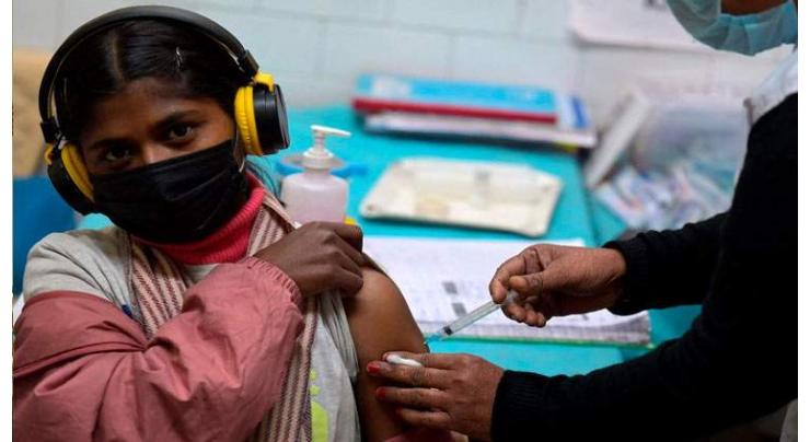 India begins vaccinating teens as Omicron fears rise
