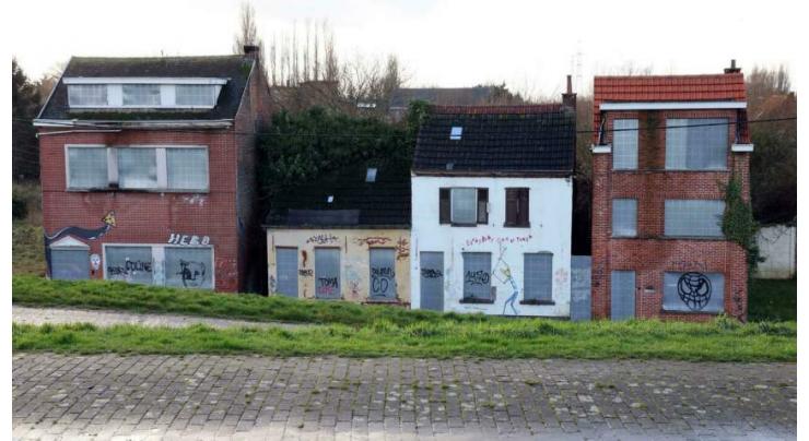 Belgium 'ghost town' fights to return to life

