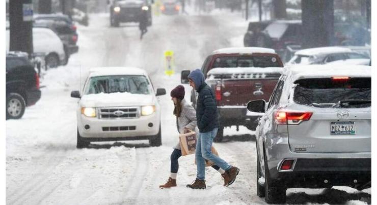 Millions hunker down as winter storm hits eastern US and Canada
