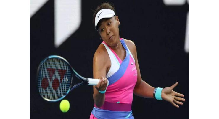 Osaka all smiles as champion moves closer to Barty showdown
