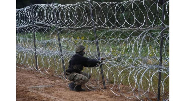 Poland begins work on new EU-Belarus border wall
