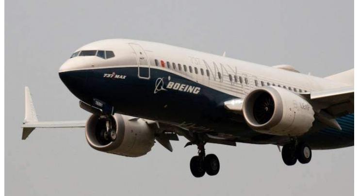 Boeing reports large loss on $3.8 bn costs tied to 787 woes
