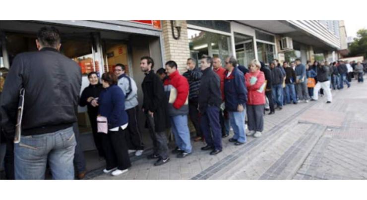 Spain unemployment falls to below pre-pandemic rate
