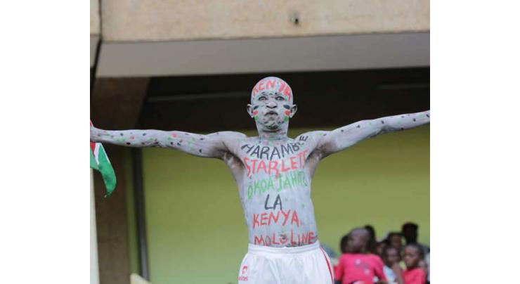 Colourful Kenyan football fan hacked to death
