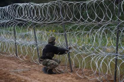 Poland begins work on new EU-Belarus border wall
