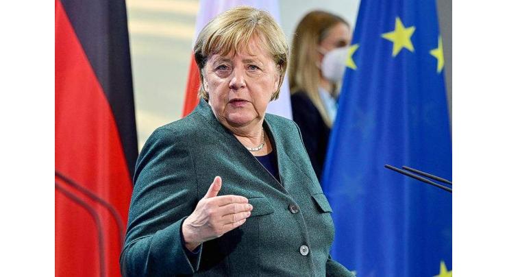 Merkel defends 2008 decision to block Ukraine from NATO
