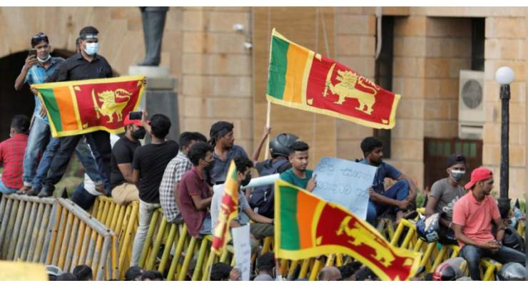 Sri Lanka leader trims cabinet of relatives ahead of IMF talks
