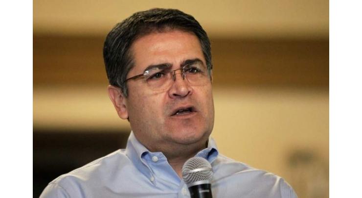 Honduras ex-president bound for US for drug trafficking trial
