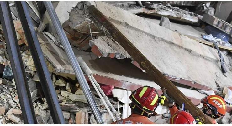Over 20 Trapped, Almost 40 Missing in Building Collapse in China - Reports