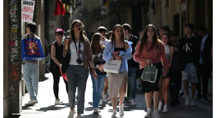 Mass tourism returns to Barcelona -- so does debate
