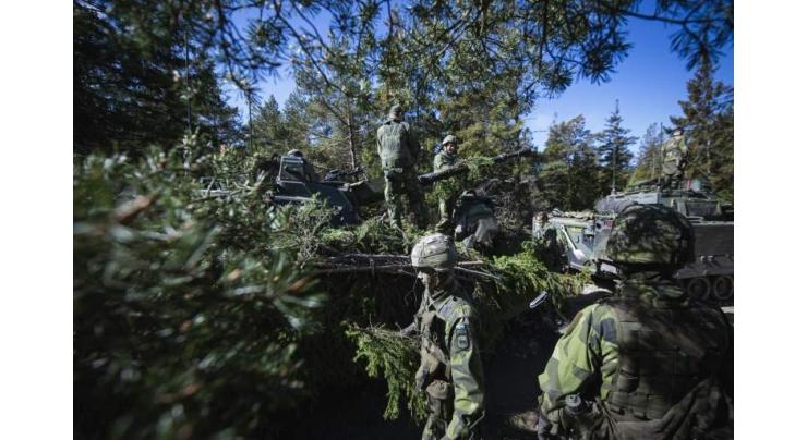 Finland, Sweden apply to join NATO as first Ukraine war crimes trial begins
