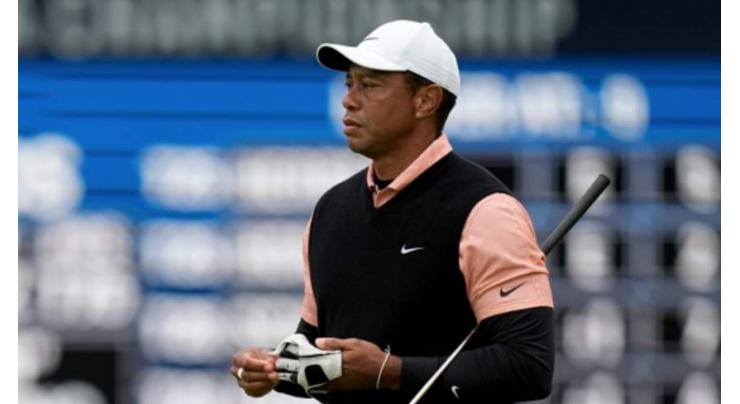 Limping Tiger struggles to nine-over 79 at rain-hit PGA
