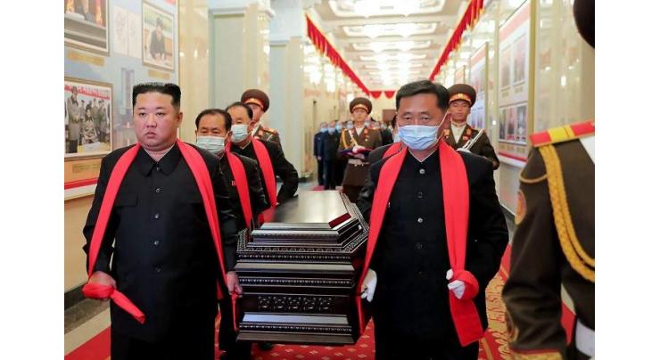 Kim Jong Un carries coffin at N. Korean military officer's funeral
