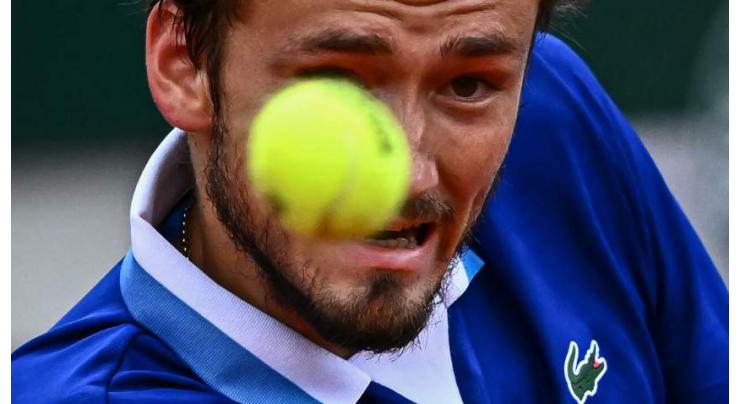 Medvedev eases through at French Open as Rune strikes teen blow
