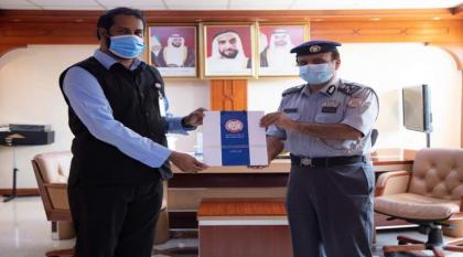 شرطة أبوظبي تحتفي بـ "يوم العمال العالمي"