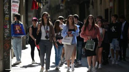 Mass tourism returns to Barcelona -- so does debate
