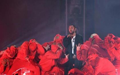 In new album, Kendrick Lamar delivers introspection and biting social critique
