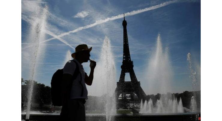 Record early heatwave sweeps France as fires flare in Spain
