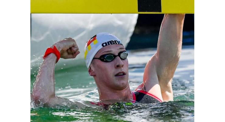 Wellbrock, Cunha win world 5km open water titles
