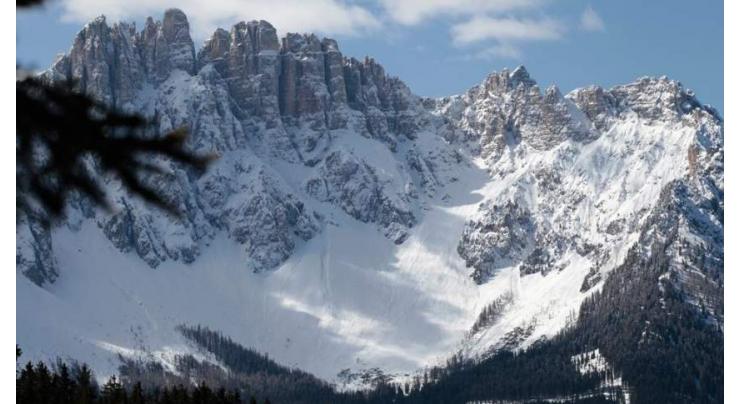 Rescuers gather body parts after Italy glacier collapse
