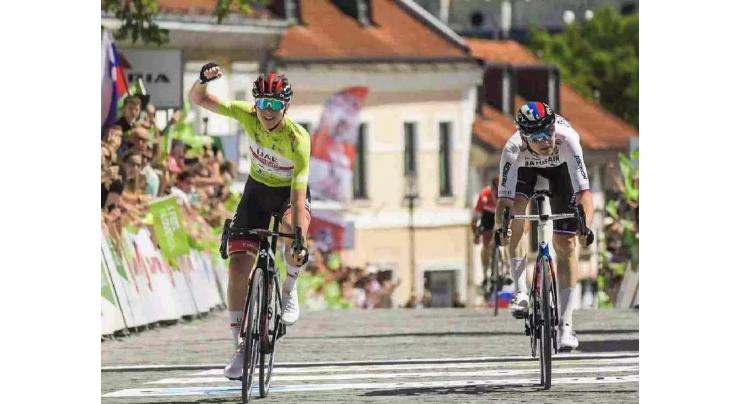 Cobble king Clarke wins Tour de France stage five with bike throw
