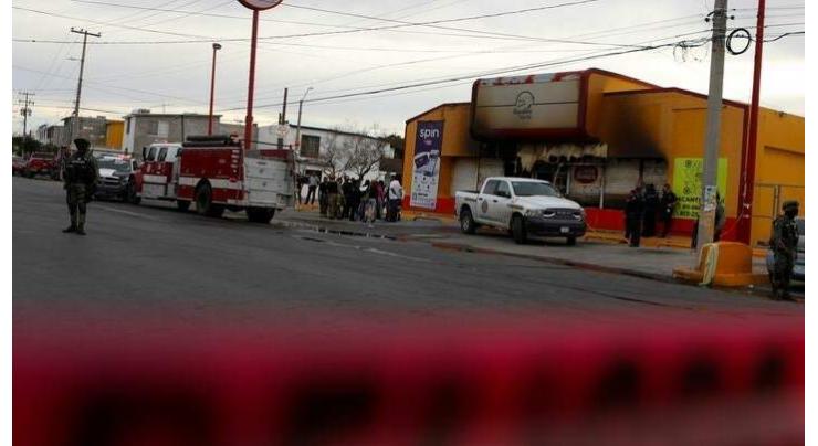 Mexican border city violence leaves 11 dead, shops burned
