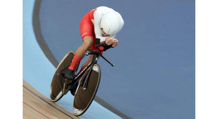 Britain's Bigham sets world one-hour track cycling record
