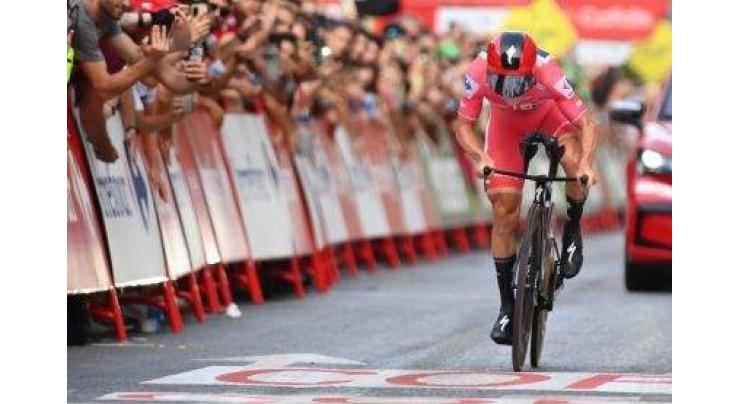 Evenepoel aces time-trial to stretch Vuelta lead
