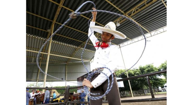 School trains new generation in Mexican cowboy traditions
