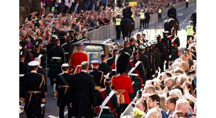 Under leaden skies, Queen Elizabeth II's coffin returns to London
