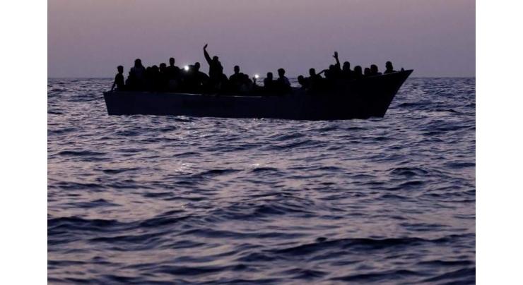 At least 34 dead after migrant boat sinks off Syria
