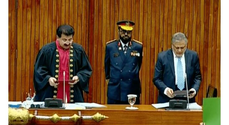 Ishaq Dar takes oath as Senator amid PTI protest