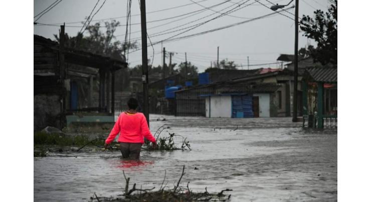 'You have to overcome': Cubans carry on as Hurricane Ian sparks blackout

