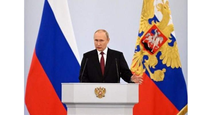 Putin signs accord to annex four occupied Ukraine regions
