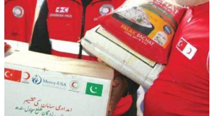 Food packs distributed among flood victims by PRC, Turkish Red Crescent
