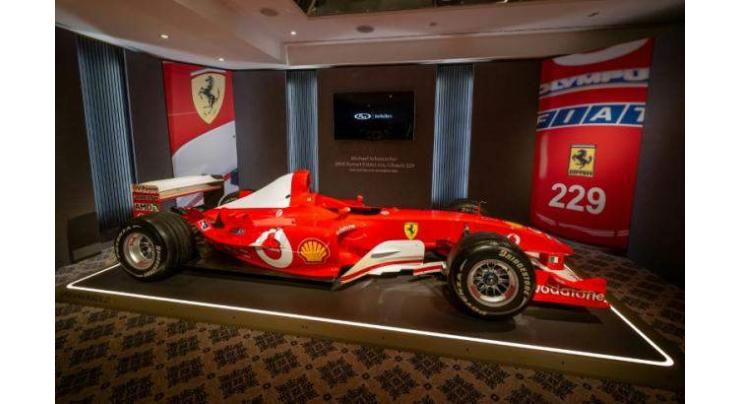 Schumacher Ferrari fetches record $13 mn at auction
