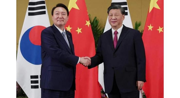 Chinese President Seeks to Speed Up Talks on Free Trade Deal With South Korea