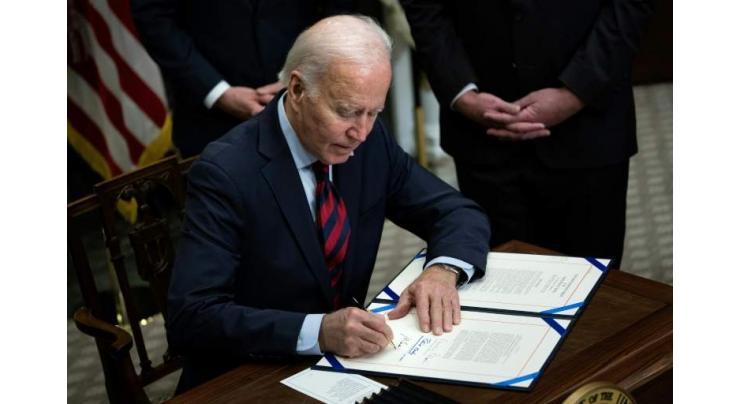 Biden signs emergency law forcing US rail unions to accept wages deal
