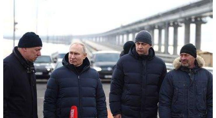 Putin visits Crimea bridge after October blast
