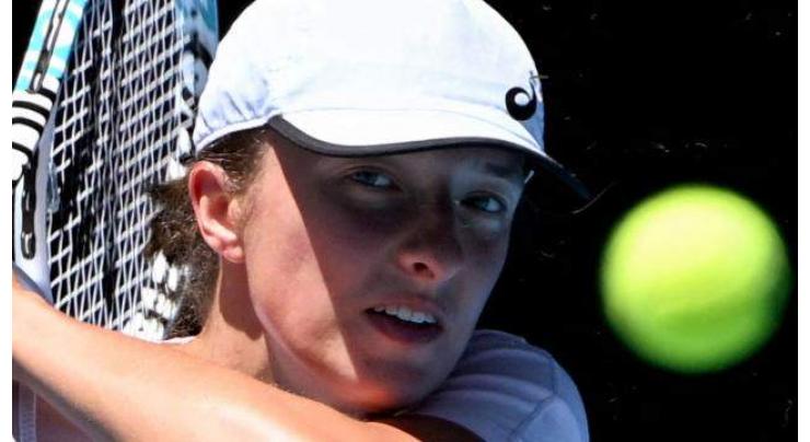 Swiatek looks for missing spark after surviving Australian Open test
