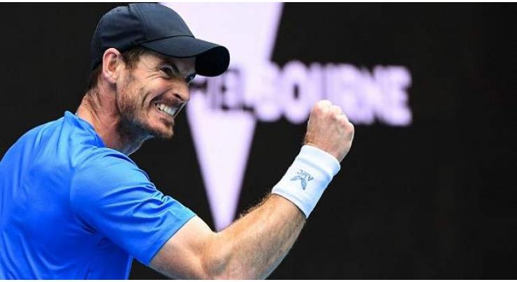 Murray wins Australian Open five-set epic as weather plays havoc
