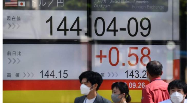 Tokyo shares open lower after US falls
