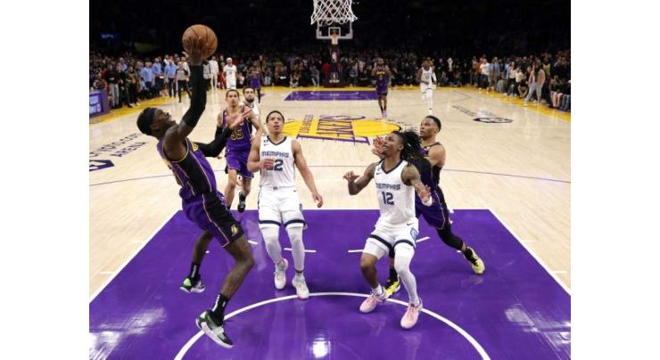 Lakers rally to stun Grizzlies, short-handed Warriors shock Cavs
