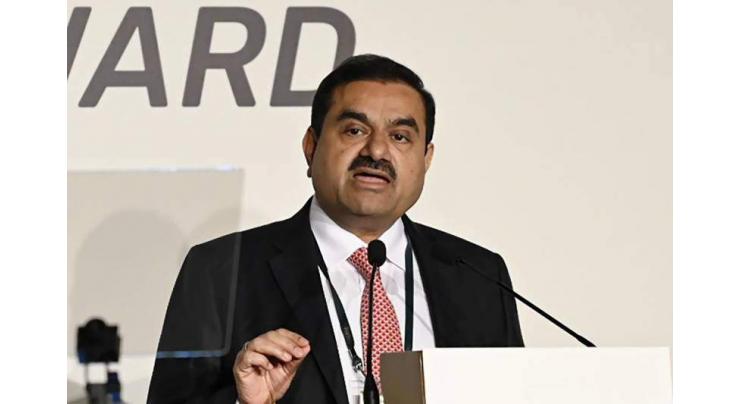Shares in India's Adani plunge 15% after fraud claims
