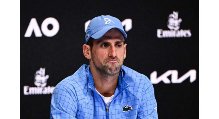Djokovic says images of father with Russian flags 'misinterpreted'
