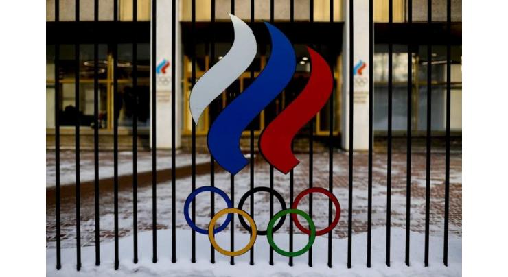 Russian Olympic chief says athletes must compete without restrictions
