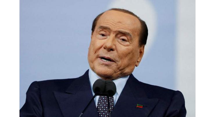 Italy's Berlusconi acquitted in starlet bribery trial
