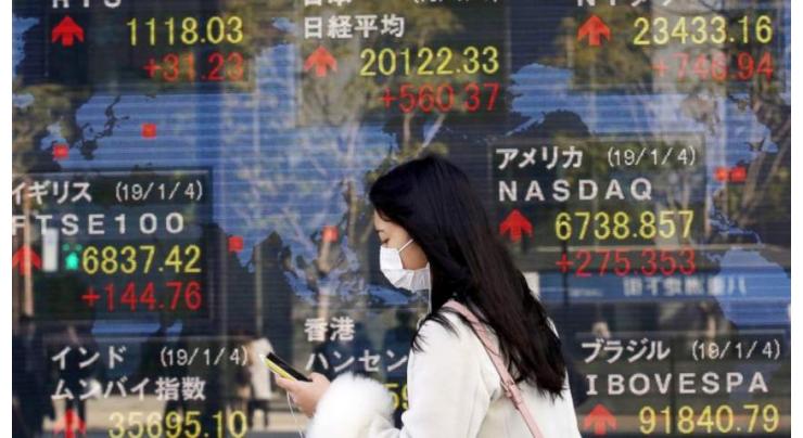 Asian markets fluctuate with nervous eye on US jobs data
